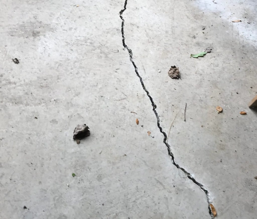 Closep of garage concrete floor crack 