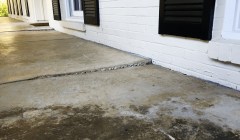 Concrete lifting on patio outside of home