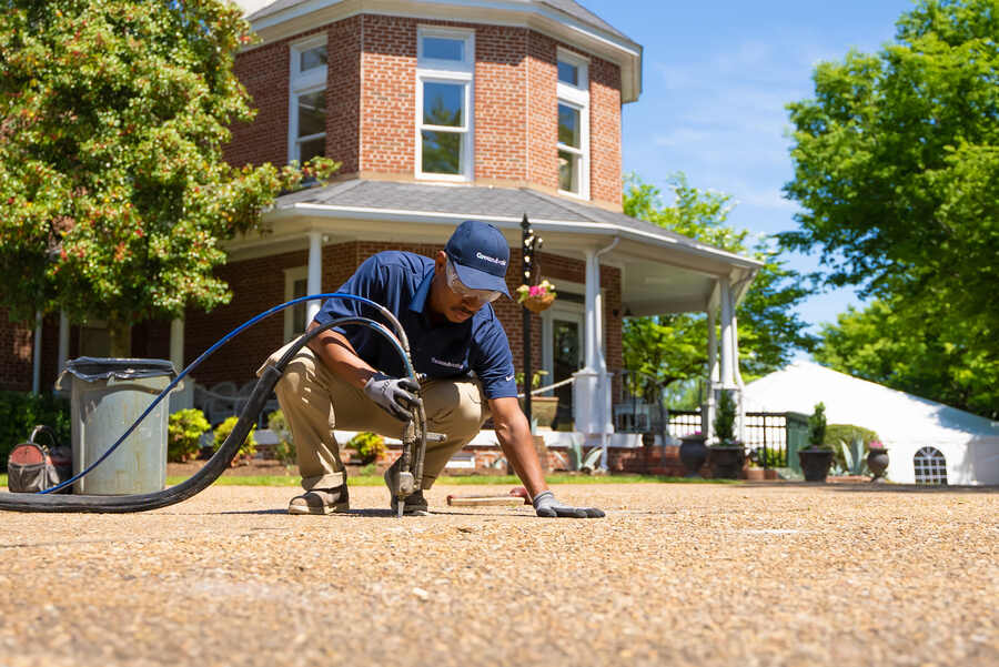 groundworks tech repairs concrete lifting on driveway