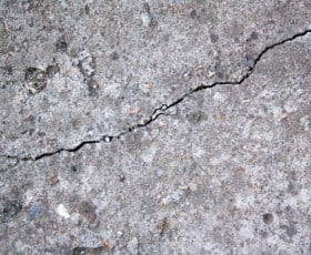 Cracked concrete on a summer day