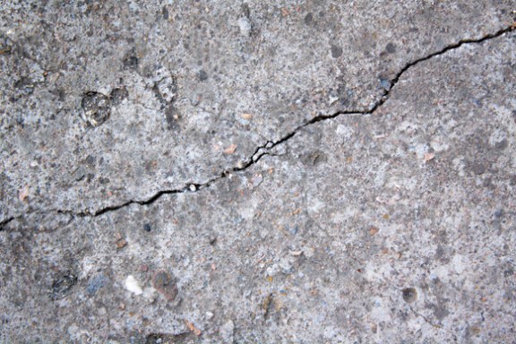 Cracked concrete on a summer day