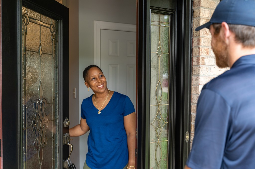 homeowner greeting groundworks inspector