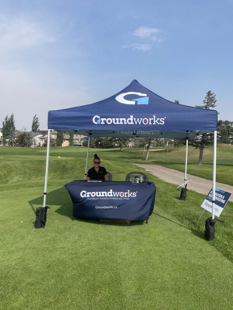 Groundworks employees setting up a booth in support of 2 Calgary charities! 