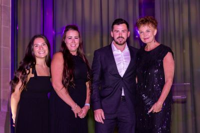 Groundworks presenting the volunteer of the year award with Calgary Flames legend Mackenzie Weegar at the Parachute for Pets' 11|52 Formal